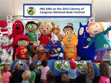 the children are standing in front of some stuffed animals and books on display at the kids's ...