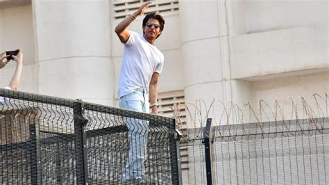 Shah Rukh Khan is grateful for ‘sea of love’ on his 57th birthday, poses with fans gathered ...