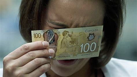 Asian-looking woman scientist image rejected for $100 bills | CBC News