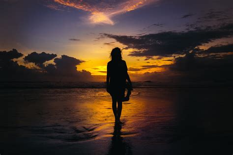 Woman Walking On Beach Pictures | Download Free Images on Unsplash