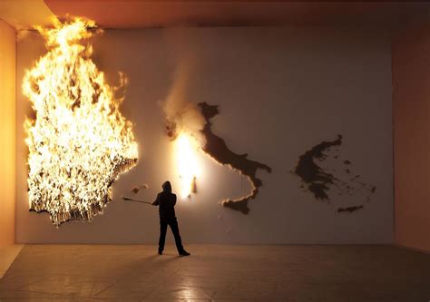 P.I.G.S. Burning Art Installation by Claire Fontaine - Design Is This