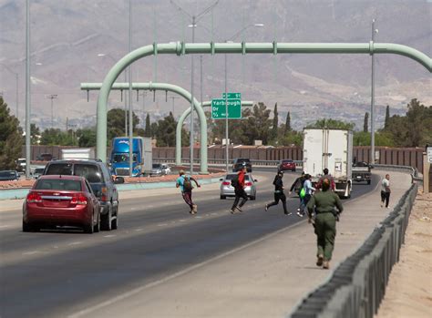 Migrants crossing Loop 375 Border Highway in El Paso in larger numbers