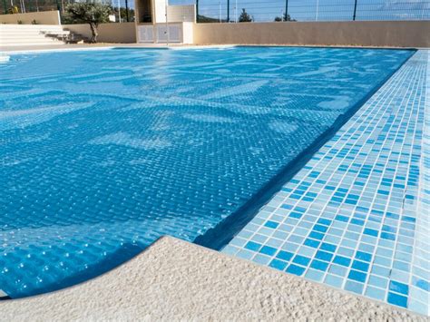 How to Use Solar Pool Covers - Cody Pools | Trust the #1 Pool Company in the USA