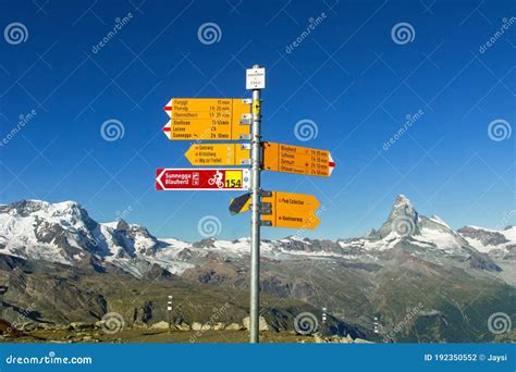 Signpost Written in German of Various Hiking Trails in Swiss Alps ...