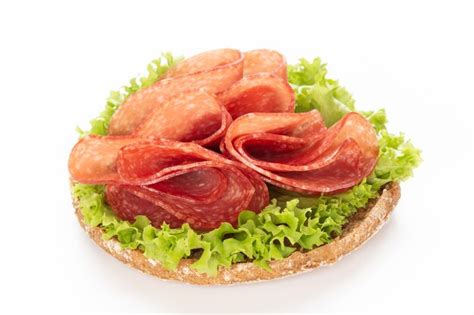 Premium Photo | Sandwich with salami sausage.