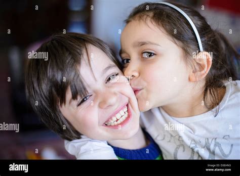 children kiss on the cheek Stock Photo - Alamy