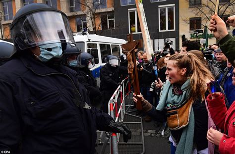 German police fire water cannons at protesters as thousands gather in Berlin anti-lockdown rally ...