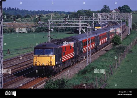 Class 87 electric locomotive with a Virgin West Coast mainline train service Stock Photo - Alamy