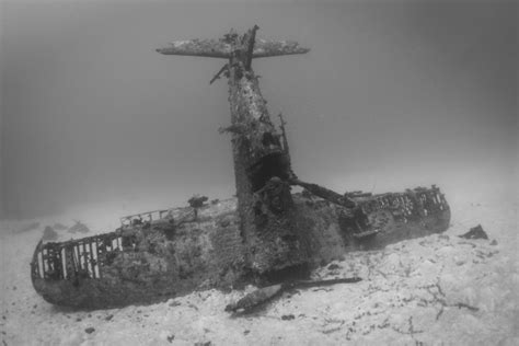 A Series of Underwater Photographs Capture a Graveyard of Sunken World War II Planes