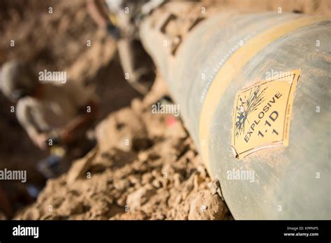 Explosive ordnance disposal technicians, assigned to the 332nd Expeditionary Civil Engineer ...