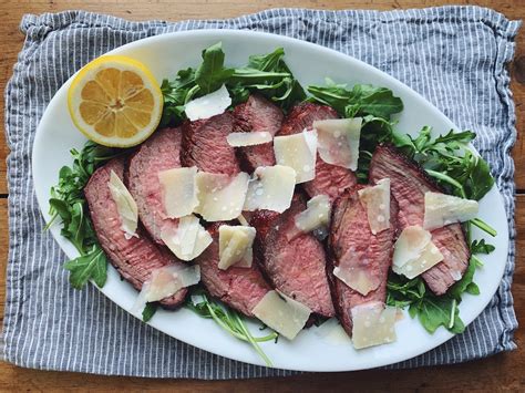 Tagliata di Manzo | Sliced Steak with Lemon and Arugula | ITALY Magazine