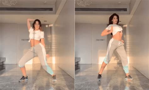 Nora Fatehi Shows Off Toned Abs While Grooving In New Video - StarBiz.com