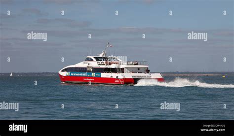 Red Funnel line Red Jet 4 passenger ferry leaving Cowes, Isle of Wight ...