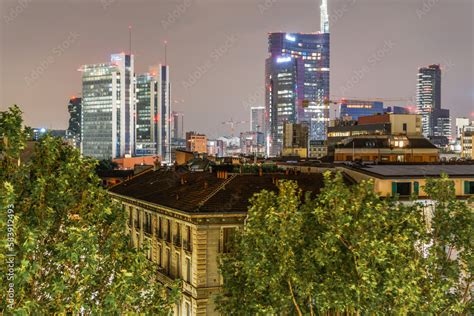 Milan, Italy skyline night view of illuminated skyscrapers at Gae ...