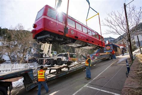 3 Pikes Peak Cog Railway cars lifted off tracks, into retirement ...