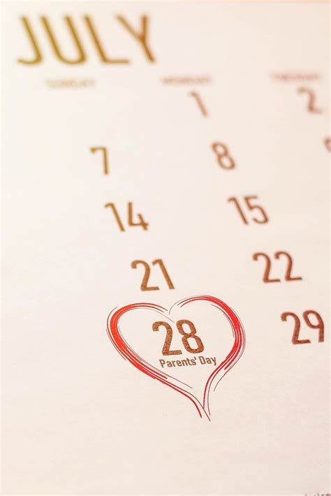 Parent's day concept. Image of July 28 selected with heart sign on the calendar - Creative ...