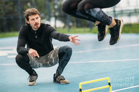 Hurdle Training With Personal Trainer Photograph by Microgen Images/science Photo Library | Fine ...