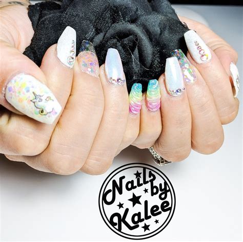 Rainbow unicorn nails with glitter