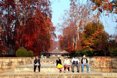 Srinagar : Tourists visit Shalimar Bagh Mughal Garden during the autumn season