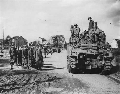 German Soldiers Surrender to 1st Army M4 Sherman Tank Crew in Aachen ...