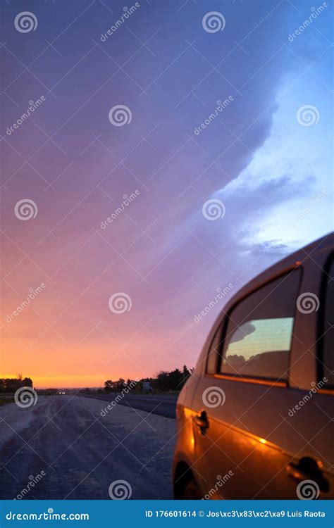 Car on a road at sunset stock photo. Image of land, speed - 176601614