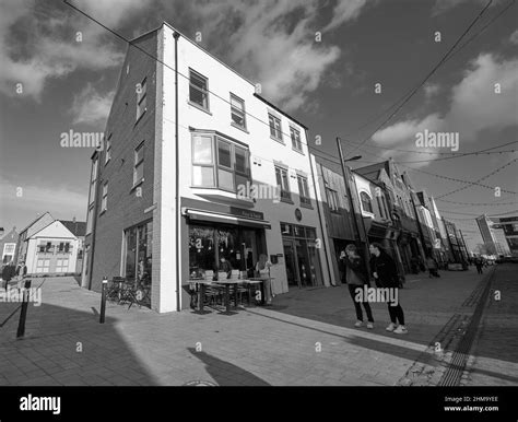Small city restaurant with outdoor seating Stock Photo - Alamy