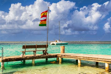 Deck and the Guna people flag on Caribbean San Blas island at politically autonomous Guna ...