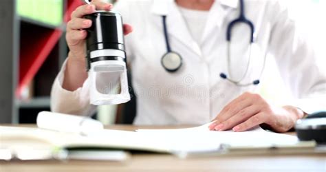 Hand of Internist Doctor Using Medical Stamp on Prescription Paper in ...