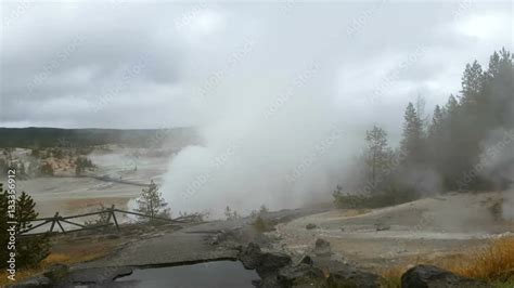 Pan Timelapse of a field full of geysers, at norris geyser basin, in ...