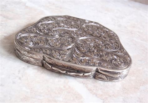 800 Silver Compact Clamshell Design Floral Engraved by cutterstone