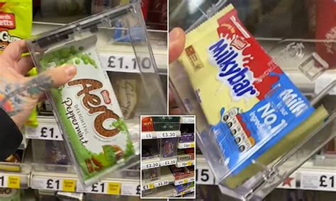 Tesco stores chocolate bars on display in locked 'thief-proof' boxes ...