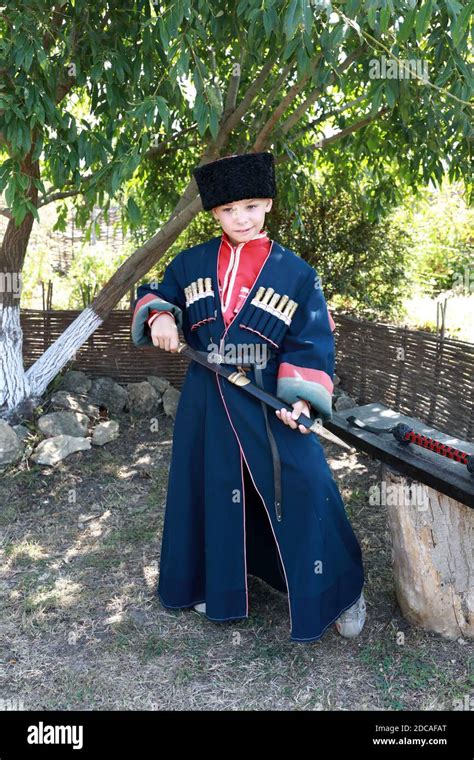 Portrait of child in traditional Cossack costume Stock Photo - Alamy