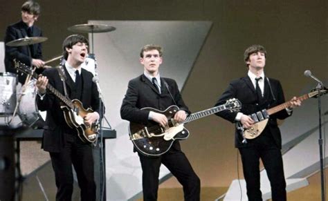 The Beatles & Neil Aspinall.