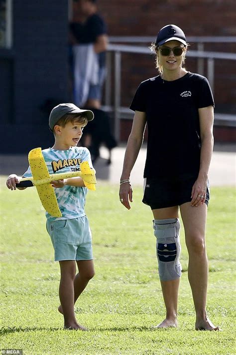 Allison Langdon wears knee brace while playing with seven-year-old son ...