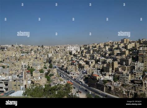 Amman skyline modern buildings and traffic on the street. Amman, Jordan ...