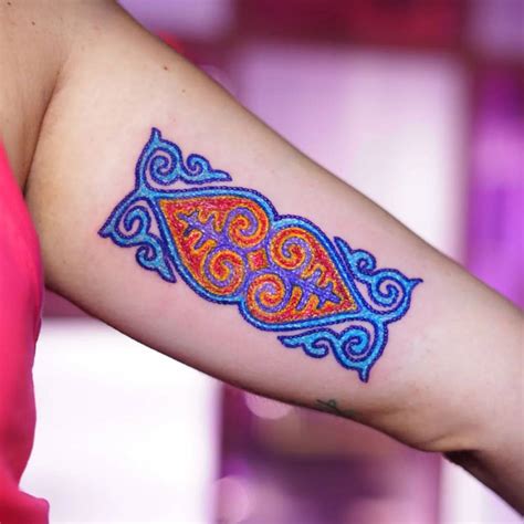 Mongolian pattern tattoo located on the inner arm,