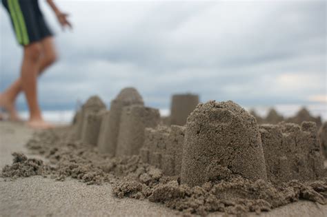 Free Images : Building sand castles, soil, beach, recreation, sea ...