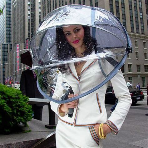 Weird #umbrella - part two: nubrella's umbrella Simply strap on the shoulder support and walk ...