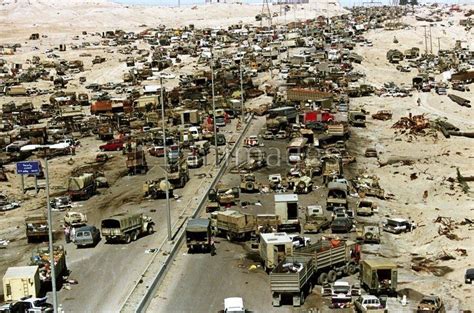 Highway of Death, Iraq, Feb. 1991. While vehicles of citizens and fleeing Iraqi military were ...