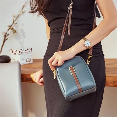 50% off on Two-Pocket Faux Leather Sling Bag | OneDayOnly