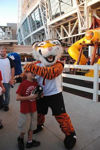 Cincinnati Bengals mascot... | ...pats the kid's head with a… | Flickr