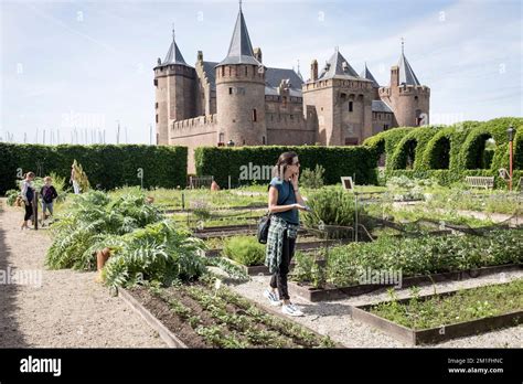 Visitors walk around the 17th century gardens within the ramparts of ...