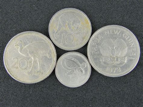 FOUR PAPUA NEW GUINEA COINS 1970-80S OP 1015