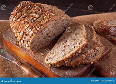 Sliced Loaf of Harvest Whole Grain Bread Stock Image - Image of rustic, bread: 179865447