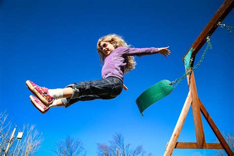 Free stock photo of flying, girl, jump off swing