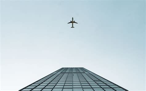 Download wallpaper 2560x1600 building, plane, sky, minimalism ...