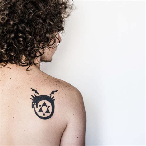 Homunculus Tattoo on the back | Tattoos, Unique tattoos, Tattoos and piercings