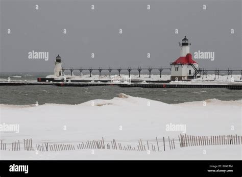 Silver Beach; St Joseph North Pier Lights on Lake Michigan; Winter; Snow and Ice; St Joseph ...