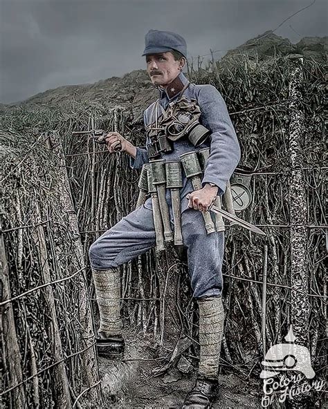 Austro-Hungarian officer showing his equipment (revolver, grenades, dagger and gas mask), trench ...