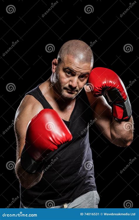 Portrait of Boxer Performing Uppercut Stock Image - Image of middle ...